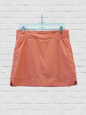 coral skort with deep side pockets